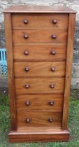 A 19th century mahogany wellington chest, 18.5ins x 18ins, height 42.5ins