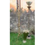 A floor standing candle stand, height 58ins, together with a brass umbrella shaped umbrella stand