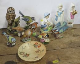 Three Royal Worcester figures, together with six Royal Worcester birds, a Grainger saucer and two