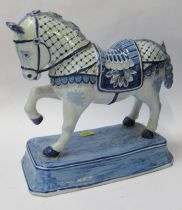 A modern delft model, of a horse