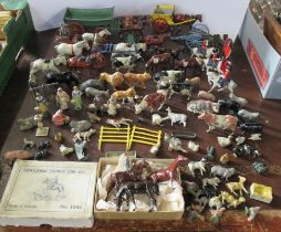 A collection of Britains lead farmyard and other animals, figures and equipment to include horse