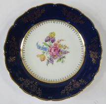 A Czechoslovakia plate, decorated with flowers, diameter 10ins