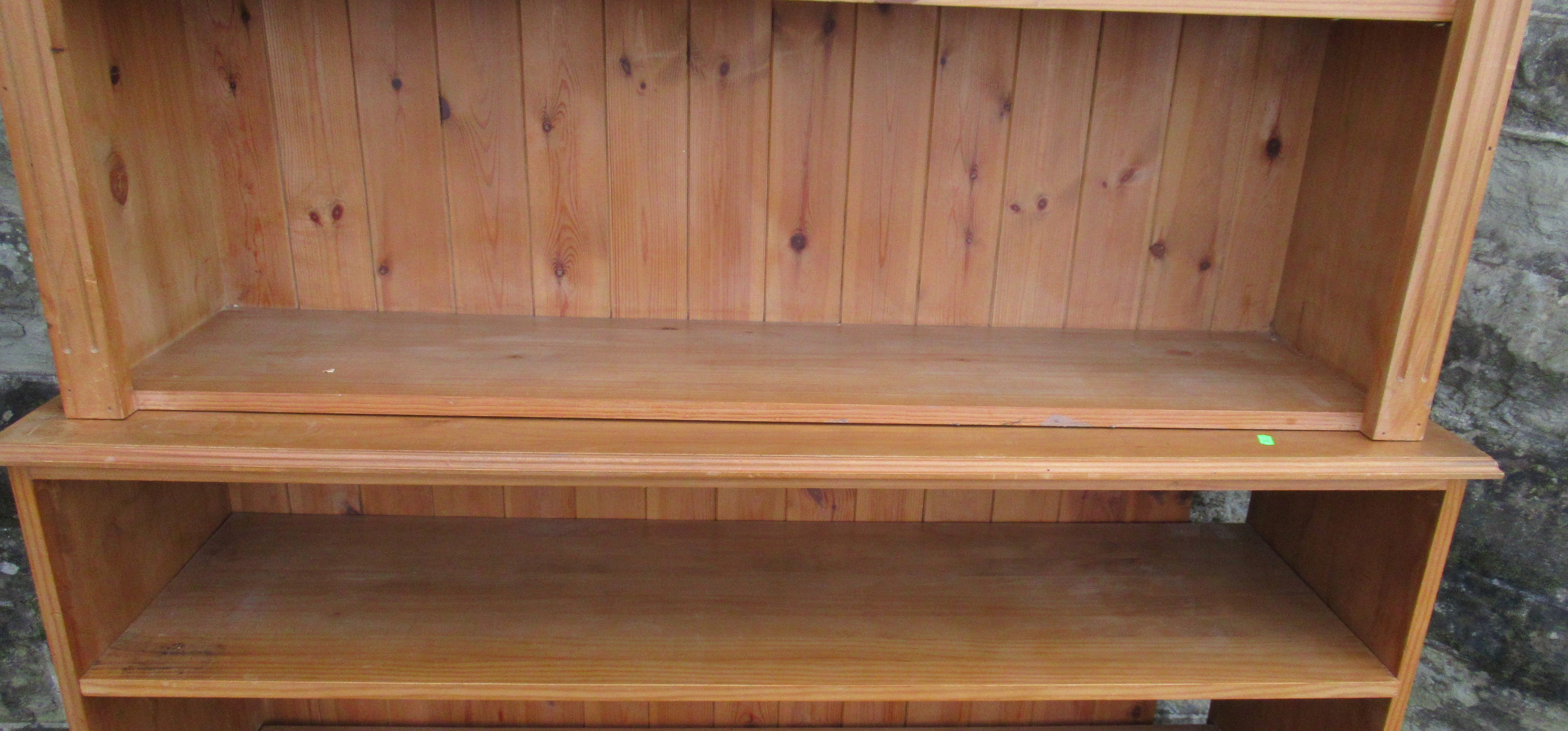 A pine double bookcase, fitted with two drawers to the base, width 54ins, depth 16ins, height 84ins - Image 2 of 2