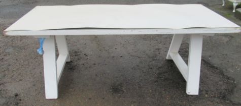 A modern white dining table, 39.5ins x 86.5ins, height 32ins