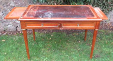 A 19th century French mahogany writing desk, with inset leather writing surface, pair of frieze