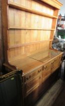 An modern possible elm dresser, with plate rack, width 62ins, height 82ins