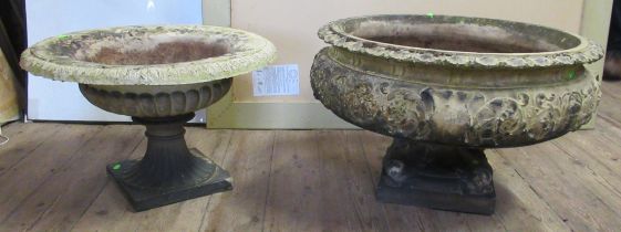 Two Classical style garden planters, height 17ins, diameter 26ins, height 15ins, diameter 23ins