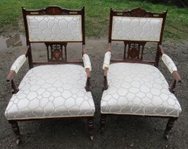 A pair of Edwardian inlaid and upholstered open  armchairs