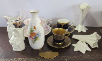 A Royal Worcester vase, decorated with flowers by K Blake, height 5.5ins, together with a collection