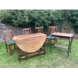 A oak gateleg table, four chairs and an occasional table
