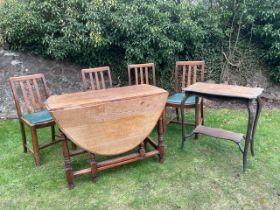 A oak gateleg table, four chairs and an occasional table