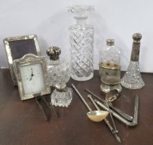 A desk clock, with hallmarked silver mounted frame, together with a picture frame, scent bottles,