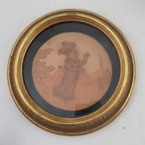 A Hadley's Worcester circular terracotta plaque, decorated with a girl with a basket of eggs falling