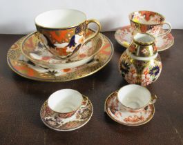 A collection of Royal Crown Derby, to include a trio, a pair of miniature cups and saucers,