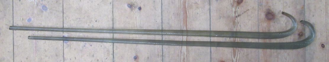 Two twisted glass walking sticks, height 38ins