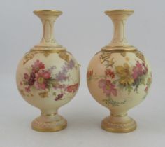 Two Royal Worcester spherical vases, decorated with flowers to a blush ivory ground, shape No