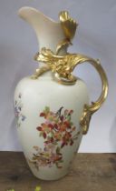 A German porcelain blush ivory jug, with gilt A symmetric handle, height 13.5ins