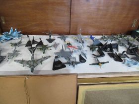 A large collection of model aeroplanes, including airfix, diecast examples