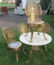 A painted metal circular garden table, diameter 32ins, together with a set of four chairs
