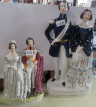 Two Staffordshire models, Princess Royal and Frederick of Prussia, heights 16ins and 15ins Condition