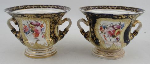 A pair of 19th century porcelain Warwick vases, in the Derby style, painted with reserves of flowers