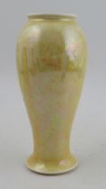 A Ruskin baluster shaped lemon ground vase, with impressed marks, dated 1924, height 9.5ins