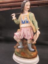 A 19th century continental coloured bisque porcelain figure in the stye of  Vion & Baurry