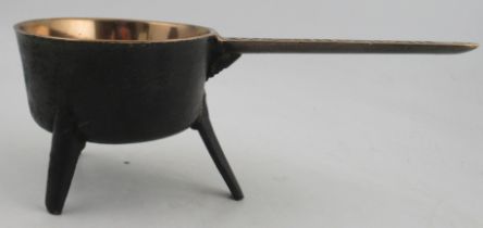 A bronze three leg skillet, with Wasbrough 4 to handle, height 6.25ins