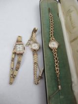 An Accurist gold ladies wrist watch, 21 jewells, Swiss made, with original box together with a