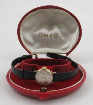 A 9ct gold cased Omega ladies wrist watch, with leather strap, in an Omega box