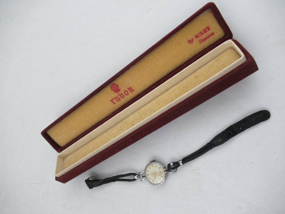 A Tudor's ladies wrist watch, with subsidiary dial, black leather strap, with original Tudor by
