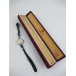 A Tudor's ladies wrist watch, with subsidiary dial, black leather strap, with original Tudor by