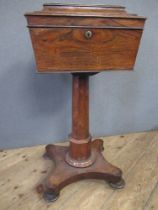 A Regency mahogany teapoy on stand,  fitted with two pairs of canisters , height 32 ins, width 16ins