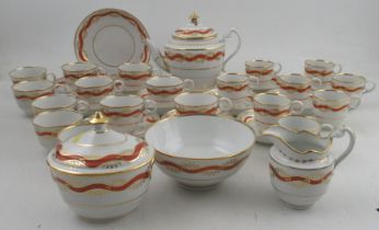A Barr's Worcester service, decorated with gilt foliage to a wavy amber band, comprising tea pot,