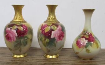 Two similar Royal Worcester vases, decorated with roses, shape No H286, restored, height 4.5ins,
