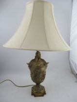 An early 20th century/late 19th century large table lamp, and shade, the gilt metal lamp with