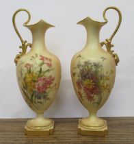 Two Royal Worcester blush ivory ewers, decorated with flowers, shape No.1944, height 9.5ins