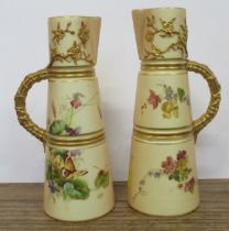 Two Royal Worcester blush ivory jugs, decorated with flowers, shape No 1047, height 8ins ,