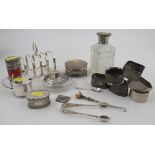 A quantity of small hallmarked silver items, to include a toast rack, 6 serviette rings, a