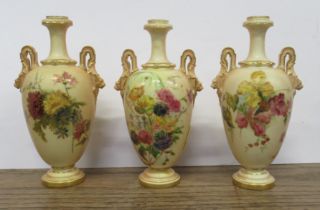Three similar Royal Worcester vases, decorated with flowers to a blush ivory ground, shape No