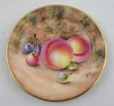 A miniature Royal Worcester plate, decorated with fruit by Price