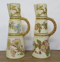 Two similar Royal Worcester gilt ivory jugs, decorated with shot silk flowers, shape No 1047, height