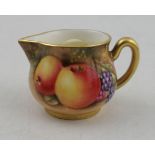 A Royal Worcester miniature milk jug, decorated with fruit by Price