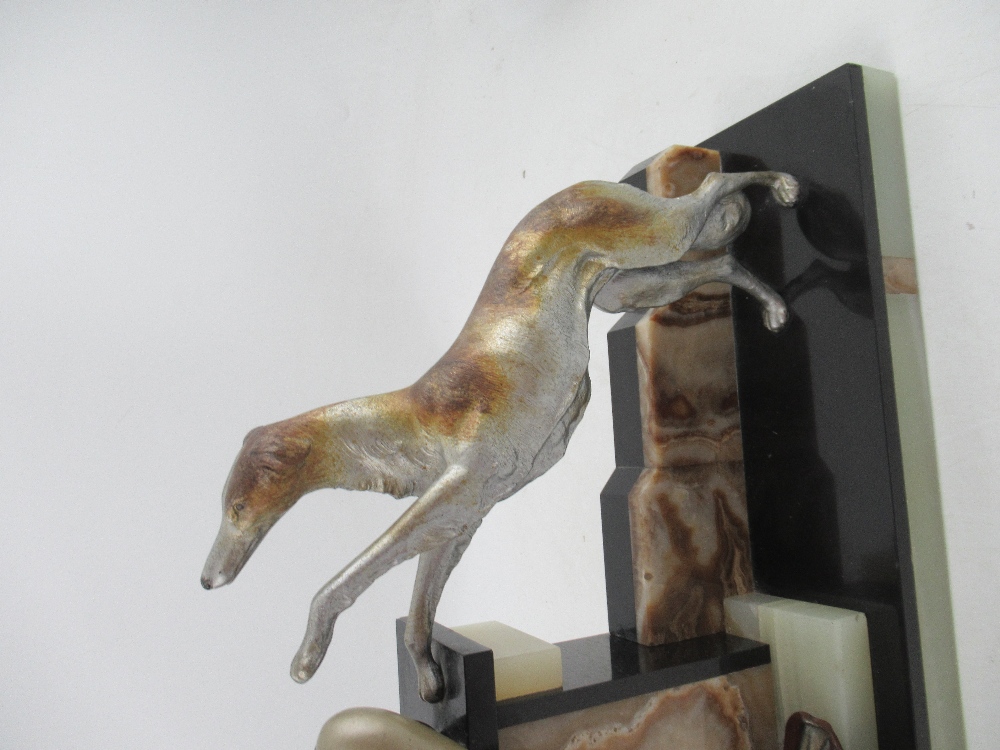 A large Art Deco model, of a lady and dog, on an onyx and marble base, width 17ins, height 17ins - Image 3 of 6