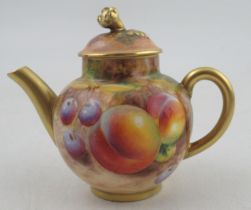 A Royal Worcester miniature tea pot, decorated with fruit by Roberts