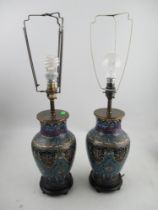 A pair of Oriental cloisonne baluster shaped table lamp bases, on wooden bases, height to top of