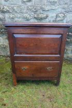 An unusual slim oak mule chest, with panel front and plain raising lid, draw below, width 30ins