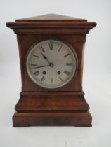 A 19th century mahogany striking mantel clock, with circular dial, height 14.5ins