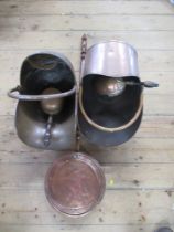 Two cooper coal scuttles, and a copper warming pan, all 19th century