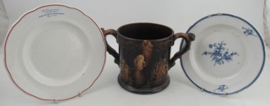 A Victorian treacle glaze loving mug, decorated with a bust of Nelson and tavern scenes, frogs to